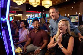 Live dealer Sic Bo table at ligaidola with transparent dome and three dice visible